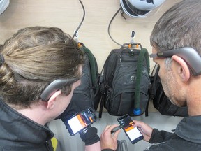 Kent Hecker tests the MUSE headband with a graduate student in the HI-SEAS Habitat.