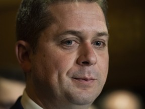 Conservative leader Andrew Scheer takes questions from reporters following a caucus meeting on Parliament Hill in Ottawa, on Wednesday, Nov. 6, 2019.