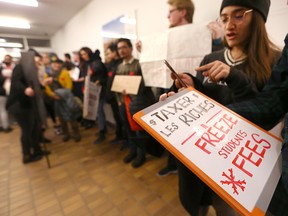 About 75 students gathered to protest tuition increases at the University of Calgary on Friday, Dec. 13, 2019. The protest was held outside the university's Board of Governors meeting.