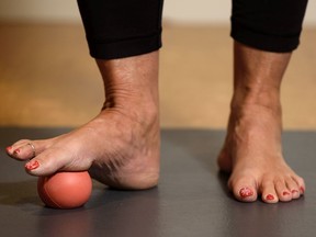 Helen Vanderburg poses with a massage ball at Heavens elevated fitness on Friday, January 17, 2020. Azin Ghaffari/Postmedia