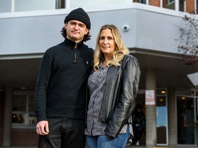 Lara Kirk-Underhill and her son Austin Kirk pose for a photo outside the Riley Park Maternity Clinic, the former Grace Hospital, on Friday, January 24, 2020. Kirk was the last baby who was born at Grace Hospital before its closure 25 years ago. Azin Ghaffari/Postmedia