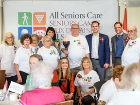 Leela Aheer, minister of culture, multiculturalism, and status of women, and MLA Matt Jones join the residents and staff at Auburn Heights Retirement Residence during the opening ceremony of the 2020 Senior Games on Monday, February 3, 2020. Azin Ghaffari/Postmedia