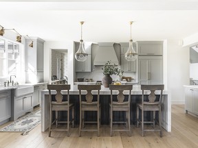 “A non-white kitchen can still be classic. It’s all about the details; the mouldings, the hardware, the colour scheme, that brings it all together to makes it timeless,” says Jenelle Erickson of SmithErickson Designs.