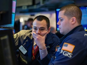 Traders working the floor of the New York Stock Exchange (NYSE) on January 31, 2020 in New York, United States. The escalating spread of the coronavirus has weakened stock markets globally and has heightened concerns of the infections spread having an impact on economic growth.