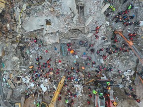 ELAZIG, TURKEY - JANUARY 26: Rescue workers work at the scene of a collapsed building  on January 26, 2020 in Elazig, Turkey. The 6.8-magnitude earthquake injured more than 1600 people and left some 30 trapped in the wreckage of toppled buildings. Turkey sits on top of two major fault-lines and earthquakes are frequent in the country. (Photo by Burak Kara/Getty Images)
