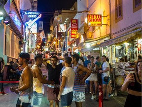 General view of the atmosphere at 'The West End' in San Antonioo on August 22, 2013 in Ibiza, Spain. The small island of Ibiza lies within the Balearics islands, off the coast of Spain. It has, for many years, had a reputation as a party destination. Each year thousands of young people gather to enjoy not only the hot weather and the beaches but also the array of clubs with international DJ's playing to vast audiences. Ibiza has also gained a reputation for drugs and concerns are now growing that the taking and trafficking of drugs is spiralling out of control.