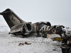 In this photograph taken on January 27, 2020 the wreckage of a US Bombardier E-11A jet is seen after it crashed in mountainous territory of Deh Yak district in Ghazni Province.