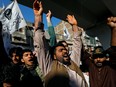 People chant slogans during a protest over the death of Iranian Major-General Qassem Soleimani, who was killed in an air strike near Baghdad, in Peshawar, Pakistan January 10, 2020.