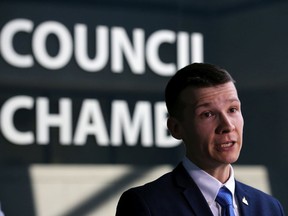 Calgary Ward 11 Councillor Jeromy Farkas speaks with media outside council chambers in this June 3, 2019 file photo.