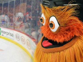 PHILADELPHIA, PA - DECEMBER 07: Mascot Gritty of the Philadelphia Flyers watches the game against the Ottawa Senators in the third period at Wells Fargo Center on December 7, 2019 in Philadelphia, Pennsylvania. The Flyers won 4-3. (Photo by Drew Hallowell/Getty Images)
