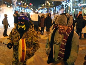 Jasper Avenue at 104 Street was closed to traffic for about an hour when a round dance was held by about 100 people on Friday January 10, 2020. The round dance was held to oppose the use of legal injunctions, police forces, and criminalizing state tactics against the Wet'suwet'en Nation asserting their own laws on their own lands. Wet'suwet'en Nation has been opposing the construction of Coastal GasLink, an LNG pipeline, on its unceded traditional territories since it was first proposed in 2012. Groups organizing the round dance say they are standing in solidarity with Wet'suwet'en land & water defenders who were forcibly removed from their unceded territories by militarized RCMP who illegally remove peaceful people from their own land.