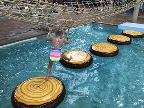Balance and strength are paramount when navigating the giant lily pads in Big Foot Pass. Courtesy Curt Woodhall
