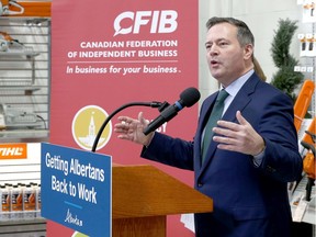 Premier Jason Kenney gestures as he speaks at Arn's Equipment in Calgary on Tuesday, Jan. 21, 2020.