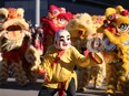 The Lion and Dragon dance entertain the crowd during Chinese New Year celebrations in downtown Calgary on Saturday, January 25, 2020. Jim Wells/Postmedia