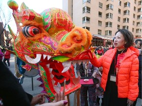 Lu Xu, the Consulate General of the People's Republic of China, participates during the Chinese New Year celebrations in downtown Calgary on Saturday, January 25, 2020. Jim Wells/Postmedia