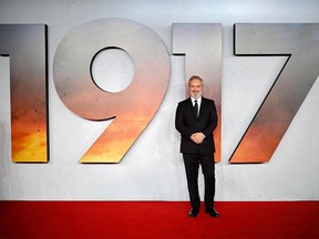 (FILES) In this file photo taken on December 4, 2019 British film director Sam Mendes poses on the red carpet as he arrives to attend the World premiere and Royal Film Performance of the film "1917" in London in support of the film and TV charity. - Universal's war drama "1917" took command of the North American box office this weekend, riding its Golden Globes success to earn an estimated $36.5 million, industry watcher Exhibitor Relations reported on January 12, 2020. The film's unexpectedly strong showing was timely, with Oscar nominations set to be announced on Monday. Last Sunday it won Golden Globes -- often a predictor of Oscar success -- for both best drama and best director (Sam Mendes). (Photo by Tolga Akmen / AFP) (Photo by TOLGA AKMEN/AFP via Getty Images)