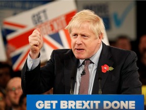 In this file photo taken on November 06, 2019 Britain's Prime Minister Boris Johnson speaks at the Conservative Party's General Election campaign launch, at the National Exhibition Centre (NEC) in Birmingham, central England. - Britain is set to leave the European Union at 2300 GMT on January 31, 2020, 43 months after Britons voted in the June 2016 referendum to leave the EU, ending more than four decades of economic, political and legal integration with its closest neighbours.