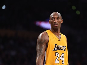 (FILES) In this file photo taken on November 21, 2015 Kobe Bryant (24) of the Los Angeles Lakers looks on during the Lakers NBA match up with the Toronto Raptors,at Staples Center in Los Angeles, California. - According to multiple US media sources,  Kobe Bryant died in a helicopter crash in Calabasas, California on January 26, 2020. (Photo by Robyn BECK / AFP) (Photo by ROBYN BECK/AFP via Getty Images)