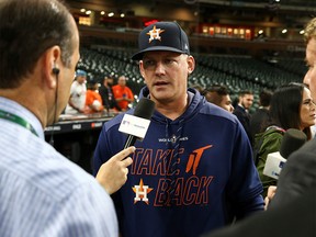 FILE PHOTO: Oct 29, 2019; Houston, TX, USA;  Houston Astros manager AJ Hinch (14) is interviewed before game six of the 2019 World Series against the Washington Nationals at Minute Maid Park. Mandatory Credit: Troy Taormina-USA TODAY Sports -/File Photo ORG XMIT: FW1