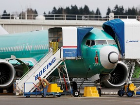 FILE PHOTO: An employee works near a Boeing 737 Max aircraft at Boeing's 737 Max production facility in Renton, Washington, U.S. December 16, 2019. REUTERS/Lindsey Wasson/File Photo ORG XMIT: FW1