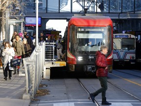 Newer and older CTrain cars at City Hall station.