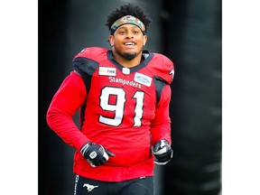 Mike Rose of the Calgary Stampeders runs onto the field during player introductions before facing the Toronto Argonauts in CFL football on Thursday, July 18, 2019. Al Charest/Postmedia