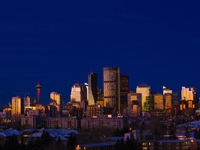 Dawn lights up Calgary's office towers on Monday, Dec. 16, 2019.