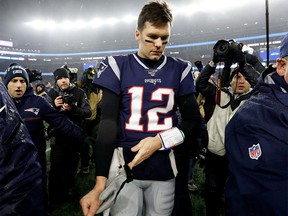 Jan 4, 2020; Foxborough, Massachusetts, USA; New England Patriots quarterback Tom Brady (12) walks off of the field after a loss to the Tennessee Titans at Gillette Stadium. Mandatory Credit: Greg M. Cooper-USA TODAY Sports     TPX IMAGES OF THE DAY ORG XMIT: USATSI-423202