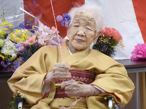 Kane Tanaka, born in 1903, smiles as a nursing home celebrates three days after her 117th birthday in Fukuoka, Japan, in this photo taken by Kyodo January 5, 2020. Mandatory credit Kyodo/via REUTERS