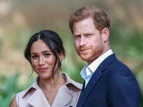 Harry and Meghan will no longer use their “royal highness” titles, Buckingham Palace said in a release Saturday.