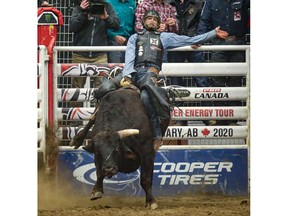 Garrett Green (Meeting Creek, AB) paired up with TNT (Vold Rodeo) in the second round of the PBR Canada's Monster Energy Tour event at Calgary's Nutrien Western Event Centre at Stampede Park on Saturday. Photo by Sean Libin/Special for Postmedia.