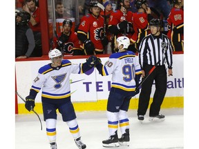 Calgary Flames goalie Cam Talbot is scored on in OT by St. Louis Blues, Ryan O'Reilly to lose the game at the Scotiabank Saddledome in Calgary on Tuesday, January 28, 2020. Darren Makowichuk/Postmedia