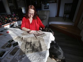 Denise Pochinko, whose mother, Jackaleen Dyck, was murdered in Winnipeg October 4, 1980 while her and her sister Jody were in the next room, looks over some news clippings and family photos in her home at Winnipeg Beach Thursday, November 21, 2019. The grisly murder is still unsolved and Pochinko is looking for answers.