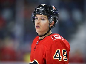 Calgary Flames Jakob Pelletier during warm-up before facing the Vancouver Canucks during pre-season NHL hockey in Calgary on Monday September 16, 2019. Al Charest / Postmedia