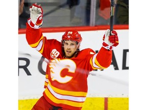 Calgary Flames Elias Lindholm celebrates after his goal on Marcus Hogberg of the Ottawa Senators during NHL hockey in Calgary on Saturday November 30, 2019.