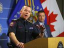 Constable Mark Neufeld, Chief Constable of the Calgary Police, and homicide unit staff, Sgt.  Martin Schiavetta, speaks to the media about the ongoing violence and homicide investigations in Calgary on Monday, January 6, 2020. Darren Makowichuk/Postmedia