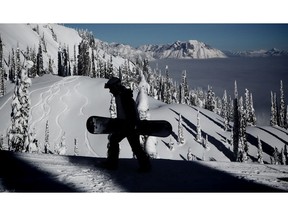 A snowboarder makes his way up Timber Bowl at Fernie Alpine Resort. Al Charest / Postmedia ORG XMIT: POS1801171321460439