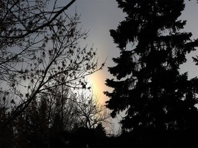 This atmospheric optical phenomenon is known as a Sun Dog is seen above Union Cemetery. Most of the time Sun Dogs are caused by the refraction and scattering of light from ice crystals high in the freezing air. The crystals act light prisms, bending the light rays passing through them. Tuesday, Jan. 14, 2020.