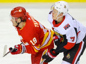 Calgary Flames Matthew Tkachuk and Brady Tkachuk of the Ottawa Senators during a game at the Saddledome on Nov. 30, 2019.