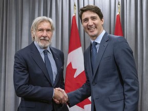 Prime Minister Justin Trudeau meets with actor Harrison Ford, vice-chair of the Conservation International board of directors, at the Nature Champions Summit in Montreal on Thursday, April 25, 2019.