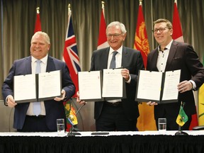 Ontario Premier Doug Ford (L) Premier Blaine Higgs of New Brunswick and Saskatchewan Premier Scott Moe announce a collaboration between the provinces on small, modular nuclear reactors on Sunday December 1, 2019. Veronica Henri/Toronto Sun/Postmedia Network