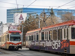 Calgary Transit CTrains move towards and away from the City Hall on Tuesday, January 28, 2020. Azin Ghaffari/Postmedia