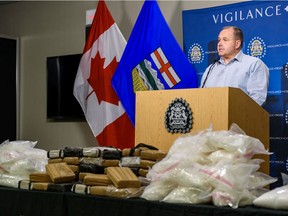 Staff Sgt. Kyle Grant, of the Strategic Enforcement Unit, speaks with the media on Tuesday, February 4, 2020 regarding the seized cocaine and crystal methamphetamine from a vehicle near Drumheller late last week worth nearly $10 million. Azin Ghaffari/Postmedia