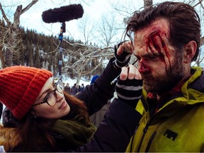 Special Effects Makeup artist  Yvonne Cox and
actor Travis Friesen on the set of the second season of Netflix's Black Summer.