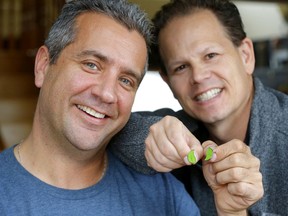 Gifts of Life: A special series starts shining a light on the need for increased organ donations. Here, Tony Timmons and Ryan McLennan show the special pins they received after Timmons donated a kidney to McLennan, who had used billboards to advertise his search for an organ. Together, the two pins form a whole. And the two men, once strangers, are now the best of friends.