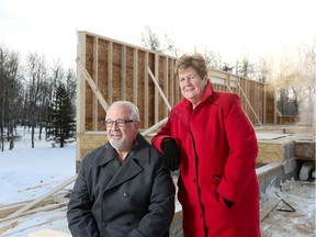 Brian and Susan Vos on the site of their bungalow being built in the Woods of Legacy.