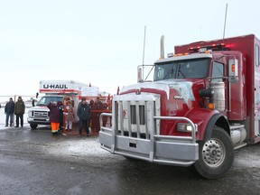 A United We Roll truck passes in front of Unifor supporters at the Federated Co-operatives Ltd terminal at a blockade in Carseland on Wednesday, Feb. 5, 2020.