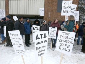Amalgamated Transit Union employees picket in Calgary at the Victoria Park bus barns on Saturday, February 8, 2020. Amalgamated Transit Union, Local 583 says city councilÕs cuts to Calgary Transit regular bus and LRT maintenance will cost more longterm and have lasting negative impact on ridership. Jim Wells/Postmedia