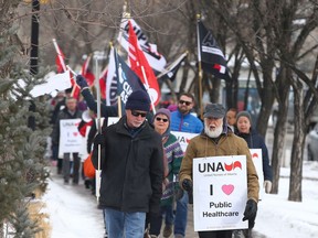 Members of the United Nurses of Alberta march outside the Foothills Hospital in Calgary on Thursday, February 13, 2020. Their goal was to show support for publicly delivered health care and all the front-line workers. Jim Wells/Postmedia
