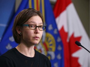 Calgary Police Det. Amy Spence, of the  Child Abuse Unit, briefs media at headquarters in Clagary on Tuesday, February 25, 2020. A Calgary mother has been charged two years after an 11-month-old girl was brought to the Alberta Children's Hospital with a broken arm on Tuesday, March 13, 2018.